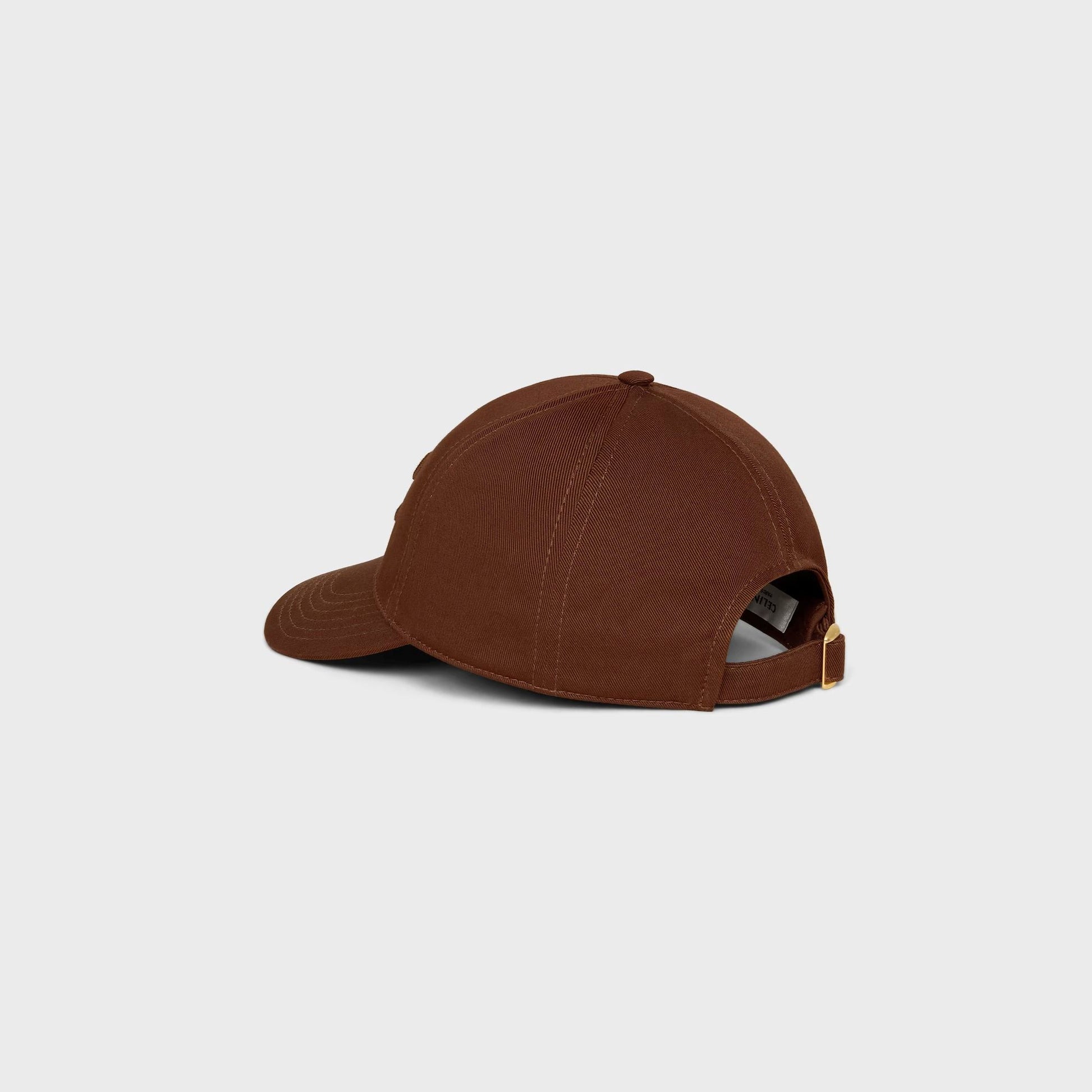 Brown baseball cap on a light gray background