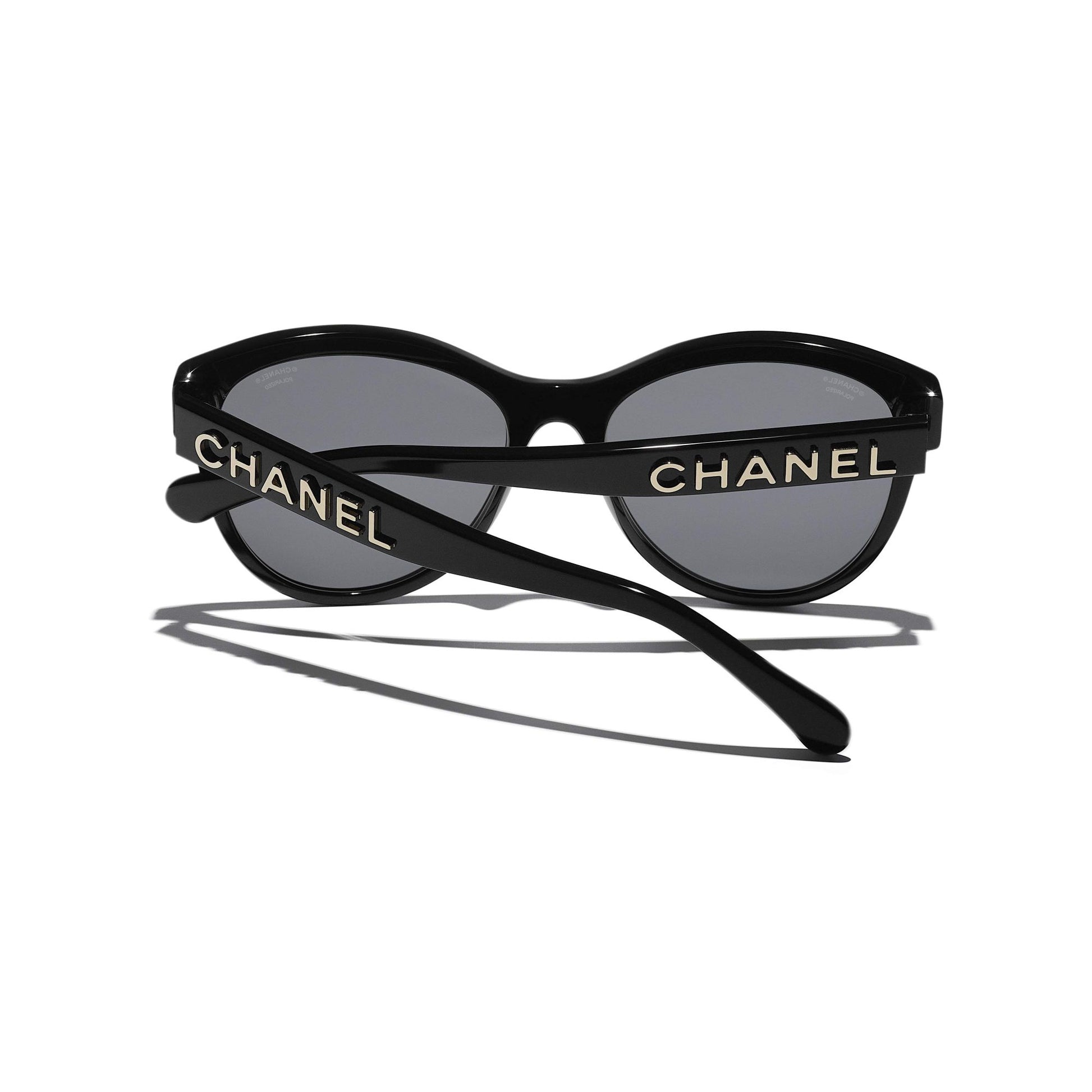 Chanel CH5458 C622T8 Round Sunglasses with gold logo on a white background