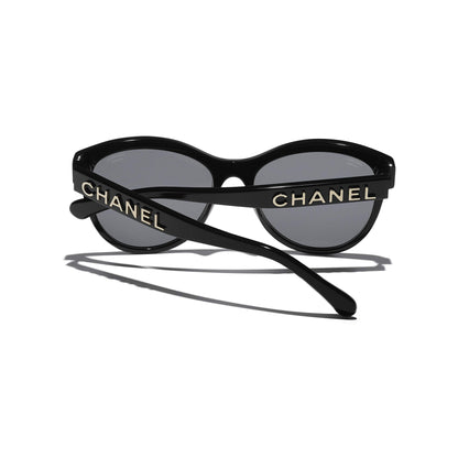 Chanel CH5458 C622T8 Round Sunglasses with gold logo on a white background