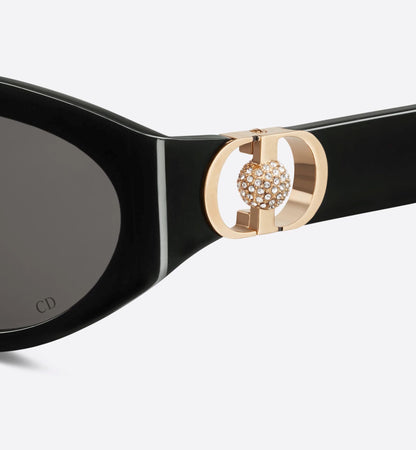 Dior 30Montaigne B7I 10A0 Black Oval Sunglasses with gold embellished frame on a white background