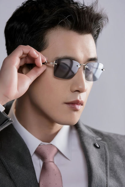 Man wearing Dior CD Diamond S11F F0A0 Square Silver Sunglasses with a gray background