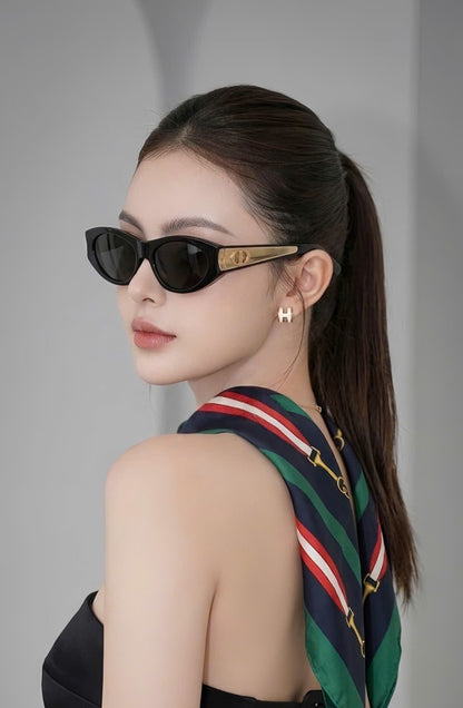 Model wearing Dior DiorGlow B2F 10A0 Butterfly Sunglasses with Gucci Scarf
