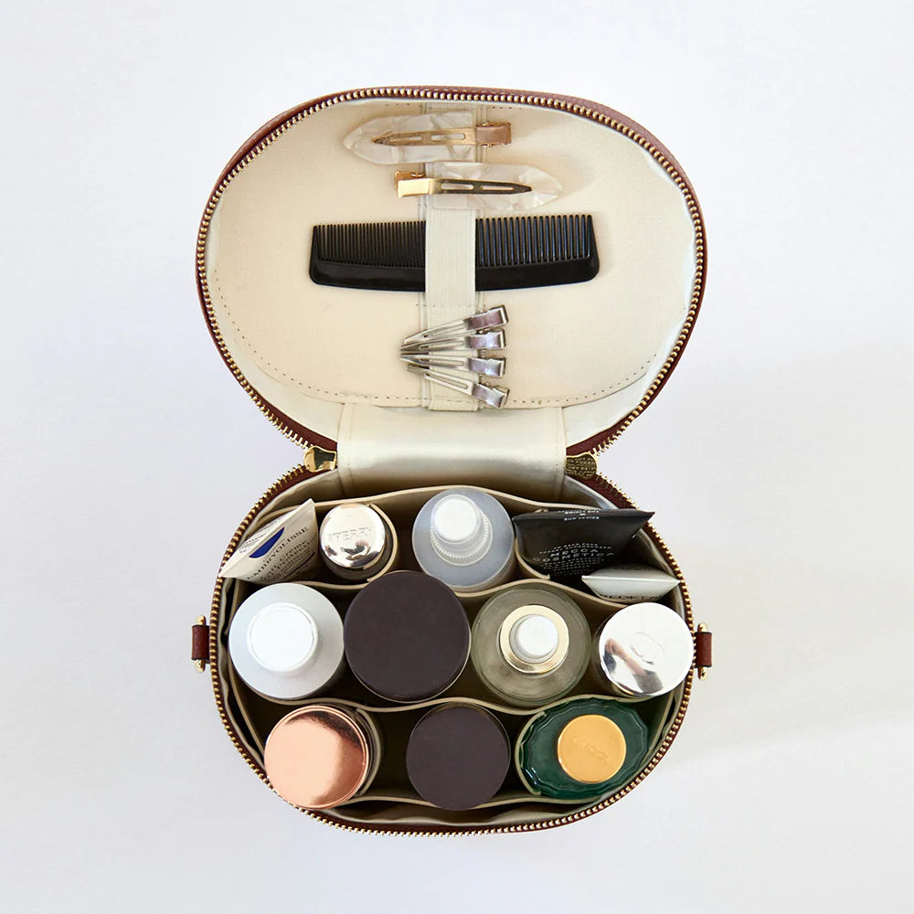 Fullfill Etoile Oval Toiletry Case Espresso with goods