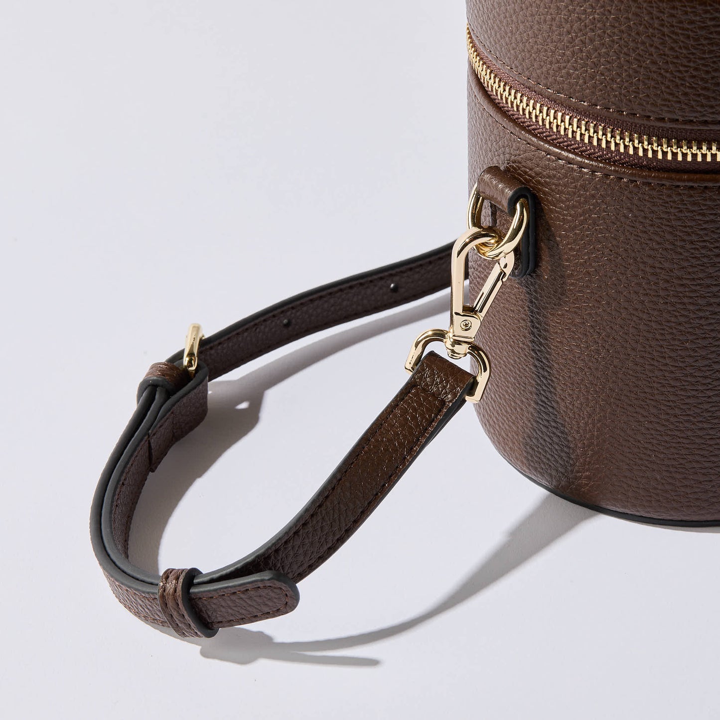 Crossbody strap of Etoile Oval Toiletry Case Espresso