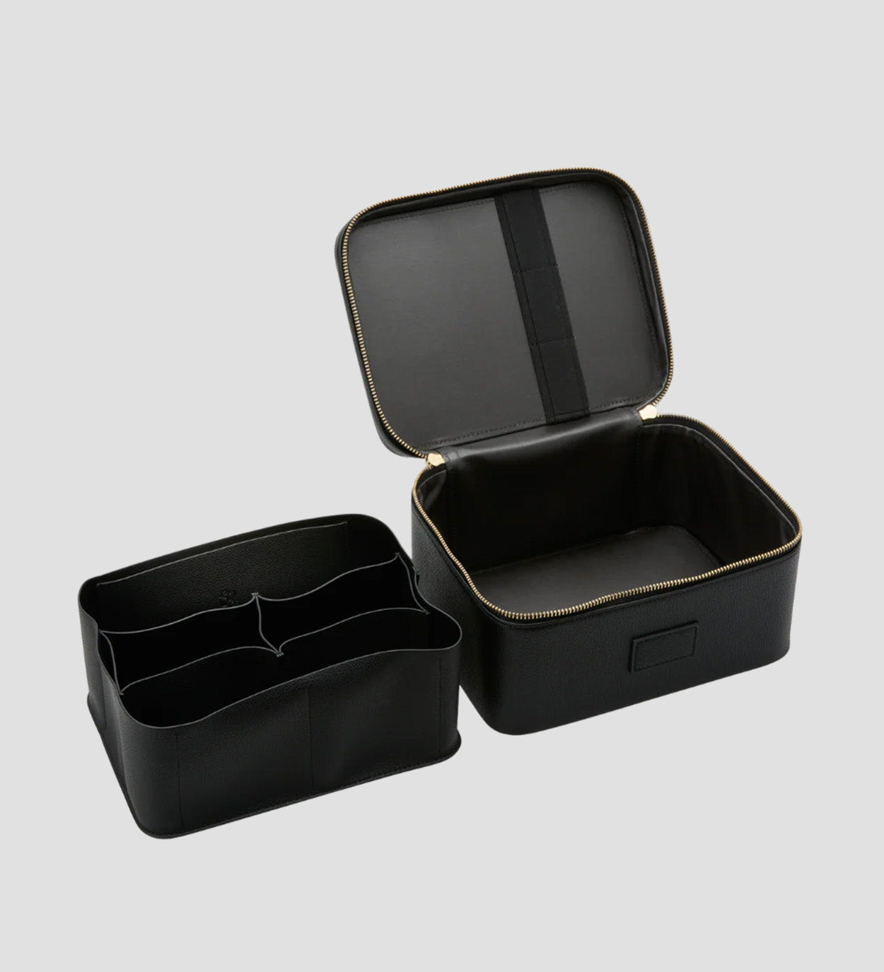 Etoile Vanity Case Black with open lid on a light gray background