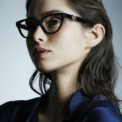 Woman wearing Fendi FE50134I-001 FF Diamonds Black Eyeglasses with a neutral background