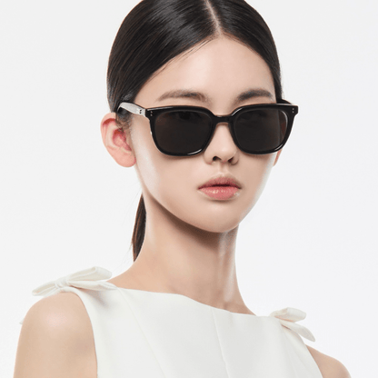 Woman wearing Gentle Monster Days Day 01 against a white background