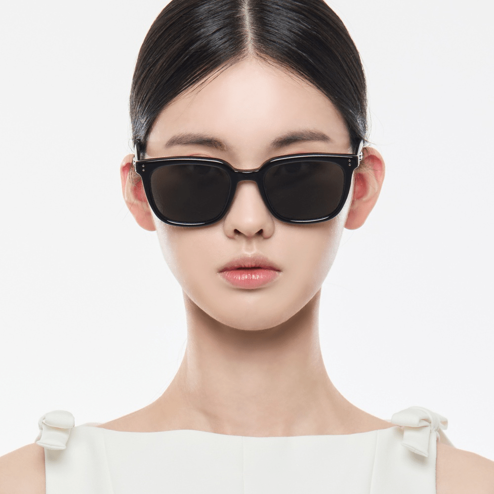 Models wearing Gentle Monster Days Day 01 against a white background