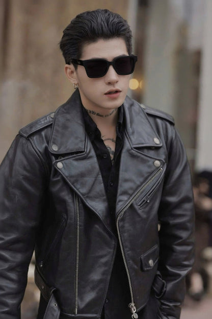 Person wearing a black leather jacket and Gentle Monster Gent 01 in an urban setting