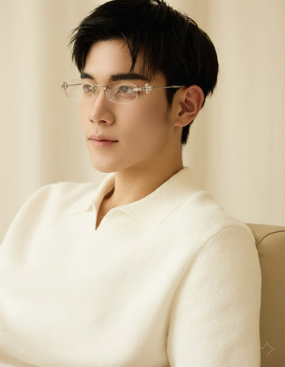 Man wearing Gentle Monster Glitz 02 and a white shirt against a beige background