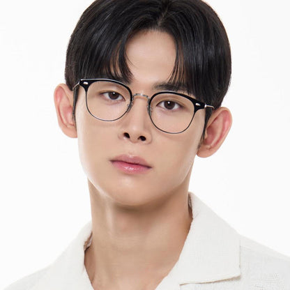 Person wearing Gentle Monster - GM Alio X 01 with a plain background