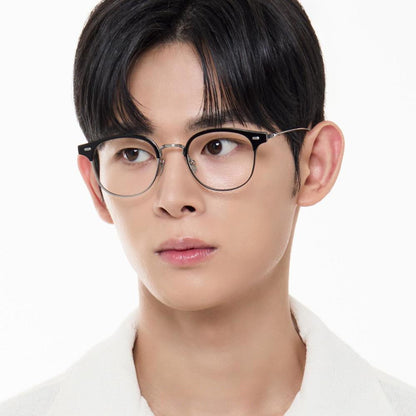 Person wearing Gentle Monster - GM Alio X 01 with a plain white background