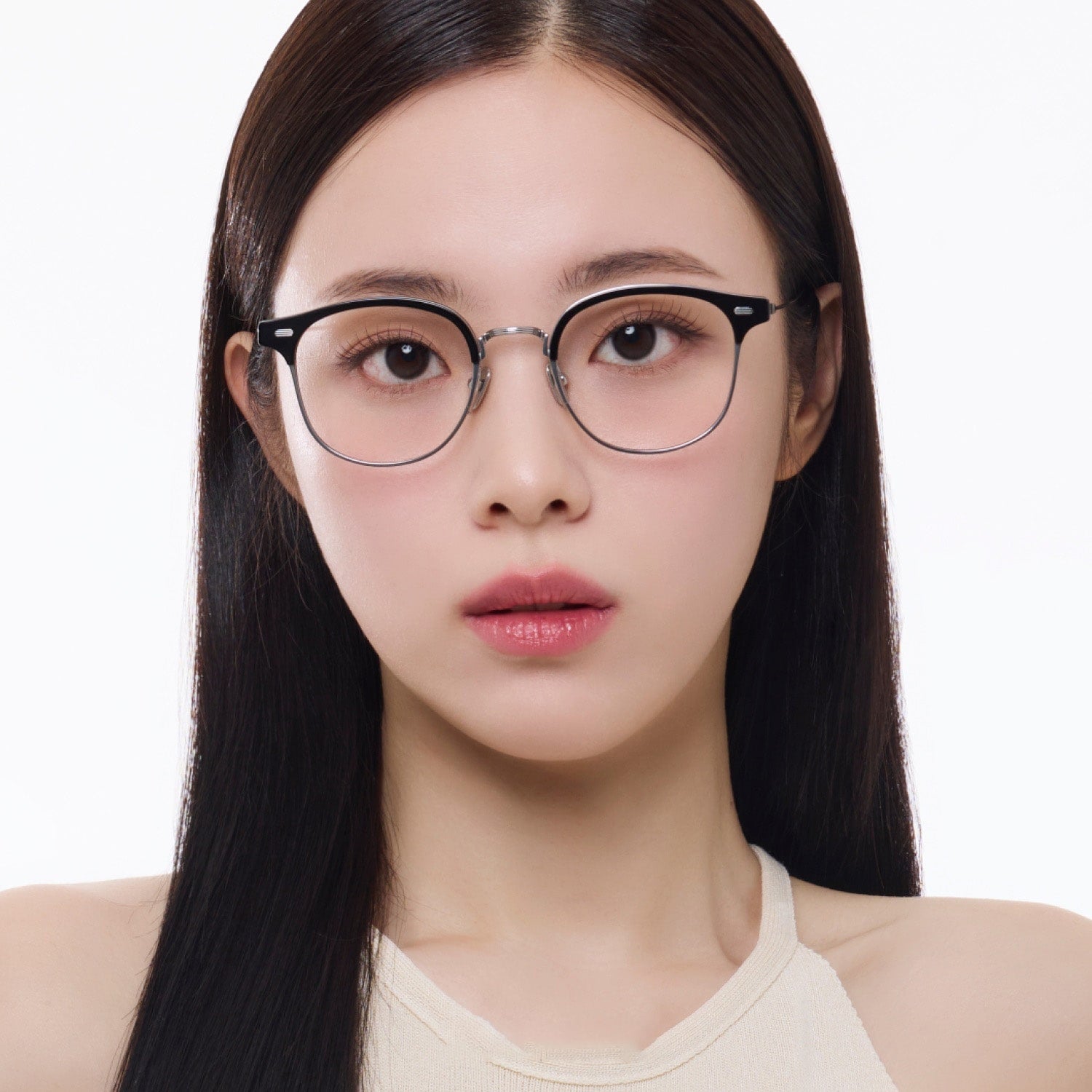 Woman wearing Gentle Monster - GM Alio X 01 with a plain background