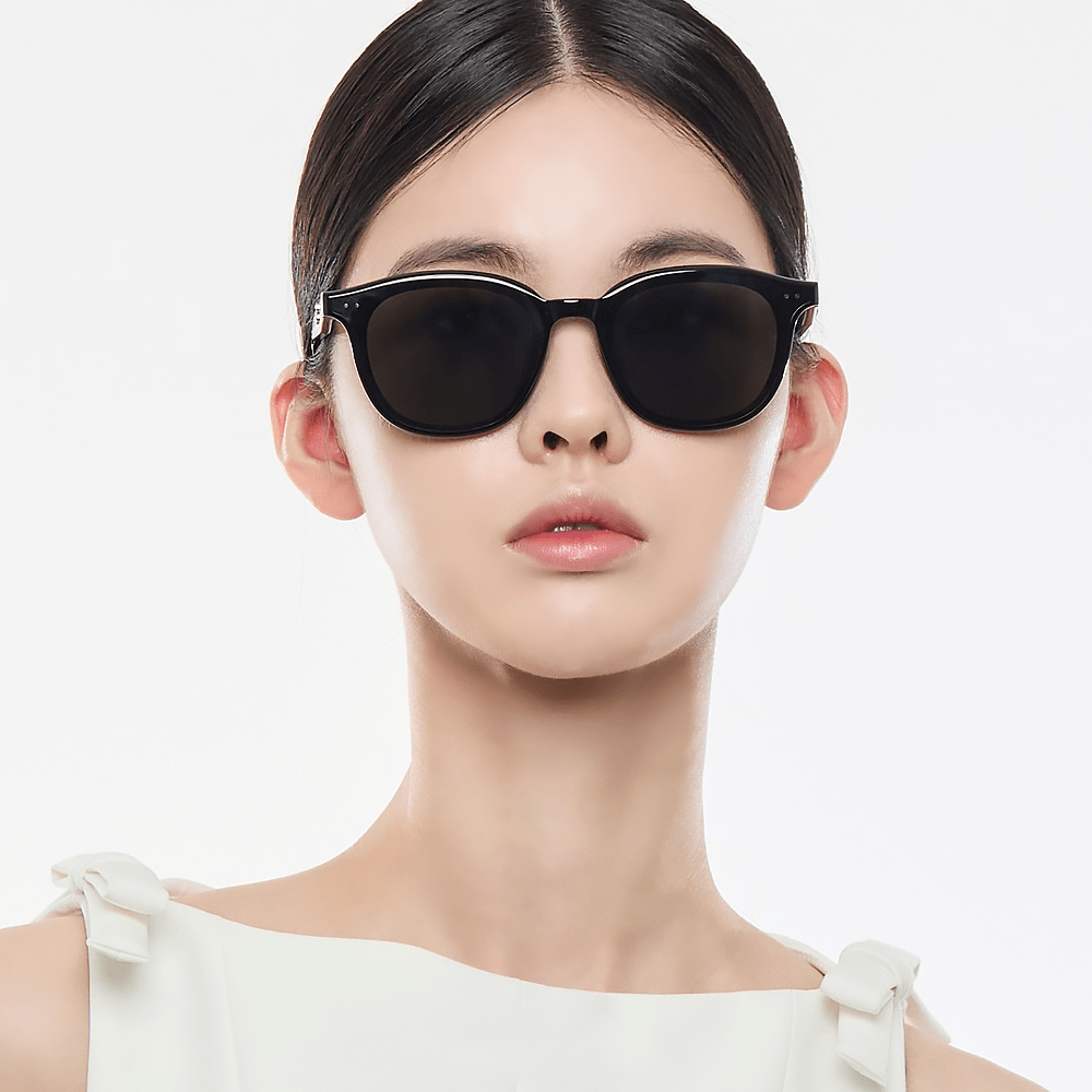 Model wearing black Gentle Monster (GM) Jude 01 with a plain background