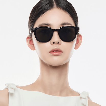 Model wearing black Gentle Monster (GM) Jude 01 with a plain background