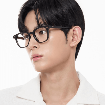 A Man wearing Gentle Monster (GM) Kubo 01 with a white background
