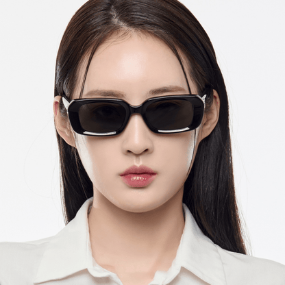 Woman wearing Gentle Monster (GM) Melrose 01 with a plain white background