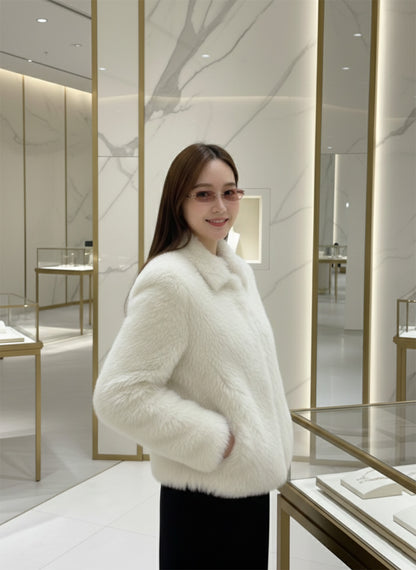 Woman wearing Gentle Monster Musubi 02(BRG) in a white fur coat in a store setting