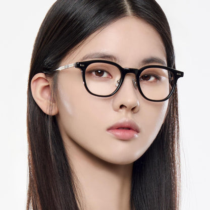 Close-up of a women wearing Gentle Monster Rob 01 Square Optical Glasses on a white background
