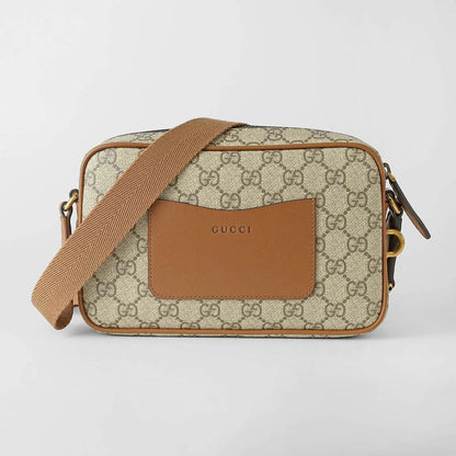Behind Gucci GG Embossed Super Mini Cognac Beige Shoulder Bag 821216 FAED3 9786 with brown strap and leather patch on a light gray background