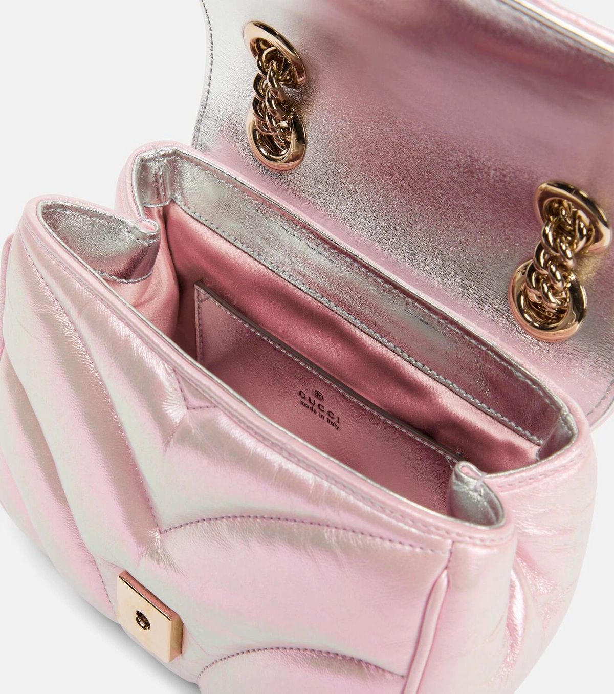 Open Gucci GG Marmont Iridescent Mini Crossbody Bag in Pink 739682 AAC2U 5826 with gold chain detail and Gucci logo on a white background