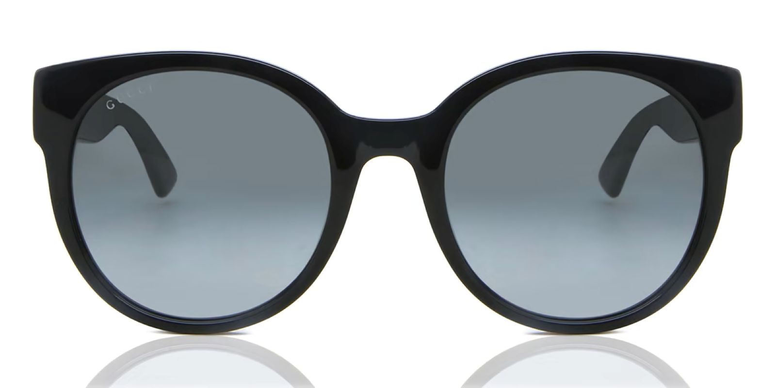 Portrait Gucci GG0035SN-001 Round Sunglasses with gray lenses on a white background