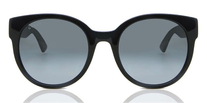 Portrait Gucci GG0035SN-001 Round Sunglasses with gray lenses on a white background