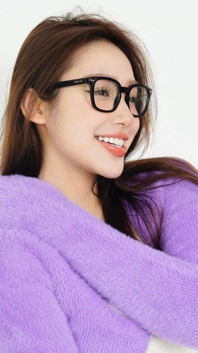 wearing GUCCI GG0184O BLACK EYEGLASSES IN ACETATE