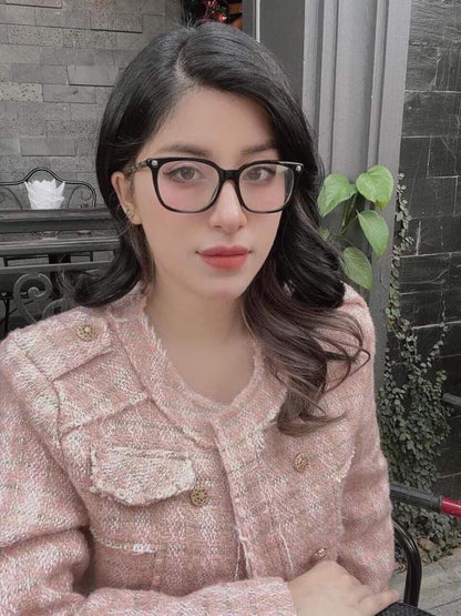 wearing GUCCI GG0218O TIGER FRAME EYEGLASSES BLACK