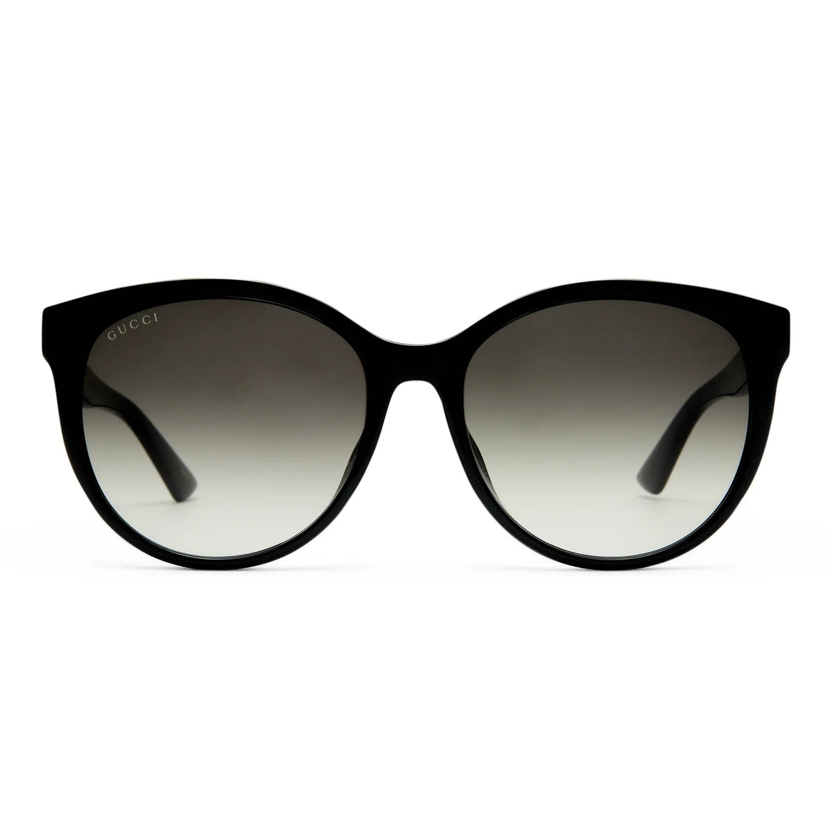 Gucci GG0636SK 001 Black Round Sunglasses with a glossy black frame and gradient gray lenses, shown against a plain white background.