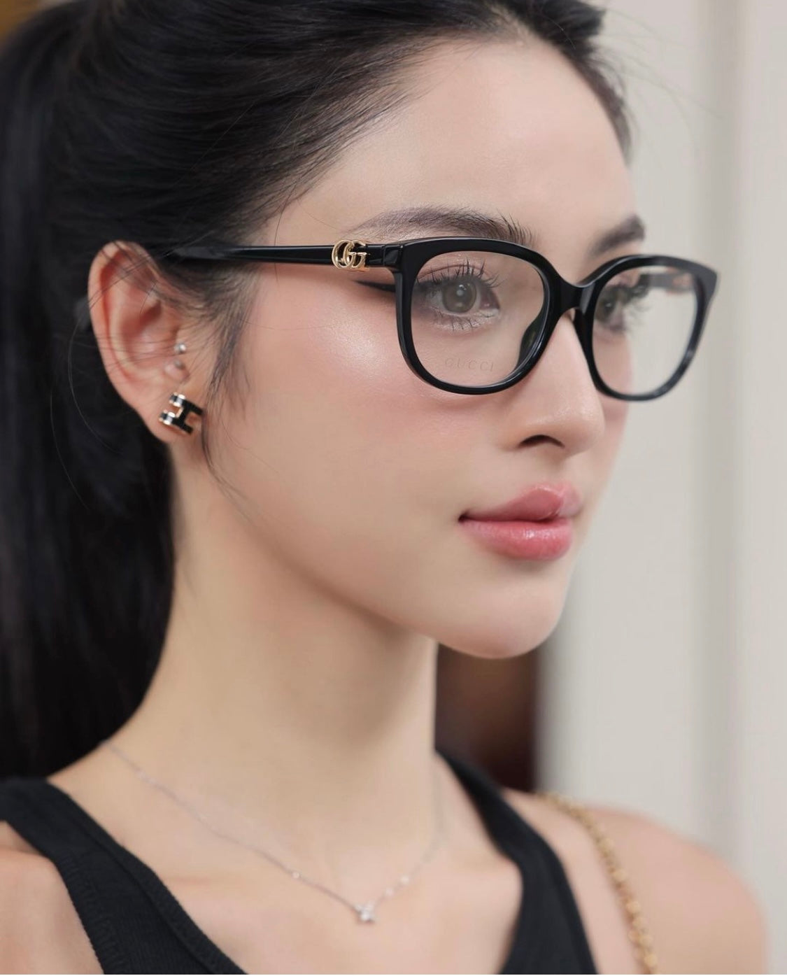 wearing GUCCI GG10750A 001 GG EYEGLASSES BLACK