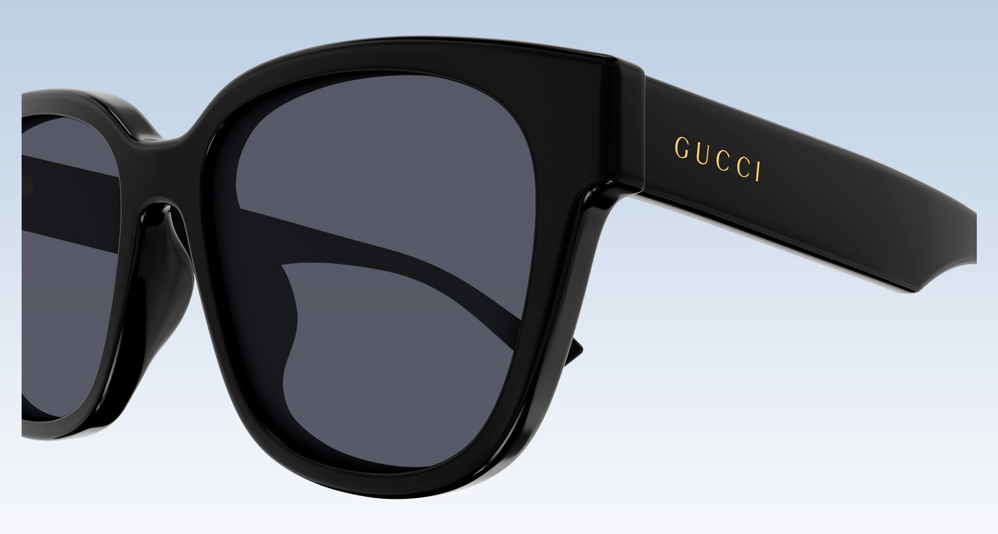 Gucci GG1430SK 001 Black Squared Sunglasses with a glossy black frame and dark gray lenses, featuring the gold 'GUCCI' logo on the temple arm.