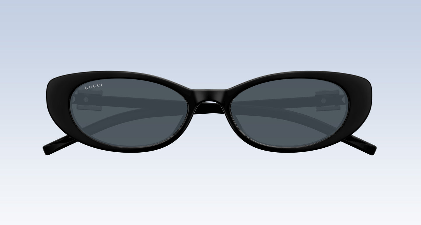 Gucci GG1680S 002 Black Oval Sunglasses with a glossy black frame and dark gray lenses, shown from the front on a light blue gradient background.