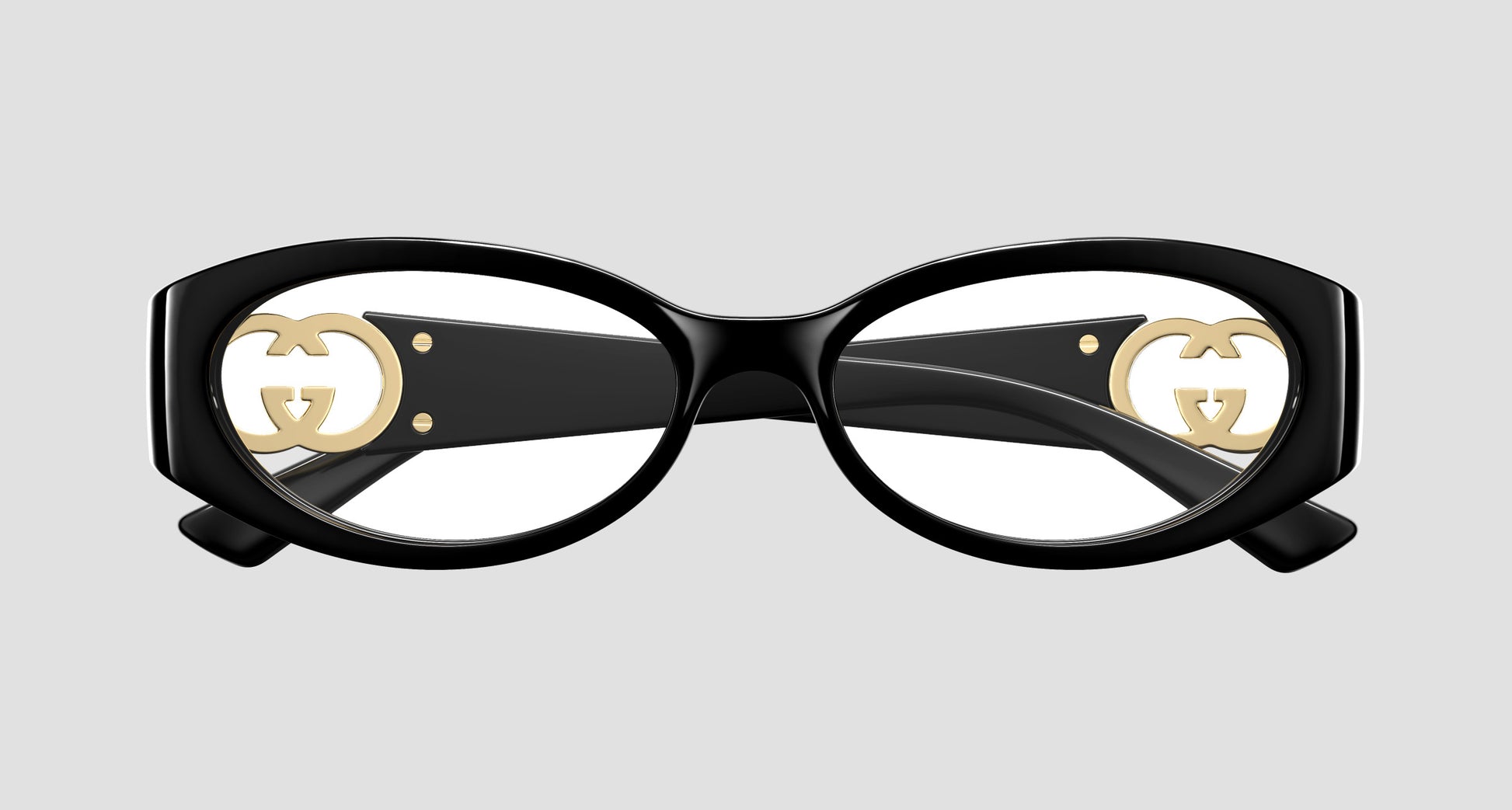 Gucci GG16930-001 Oval Eyeglasses with gold logo on a light gray background