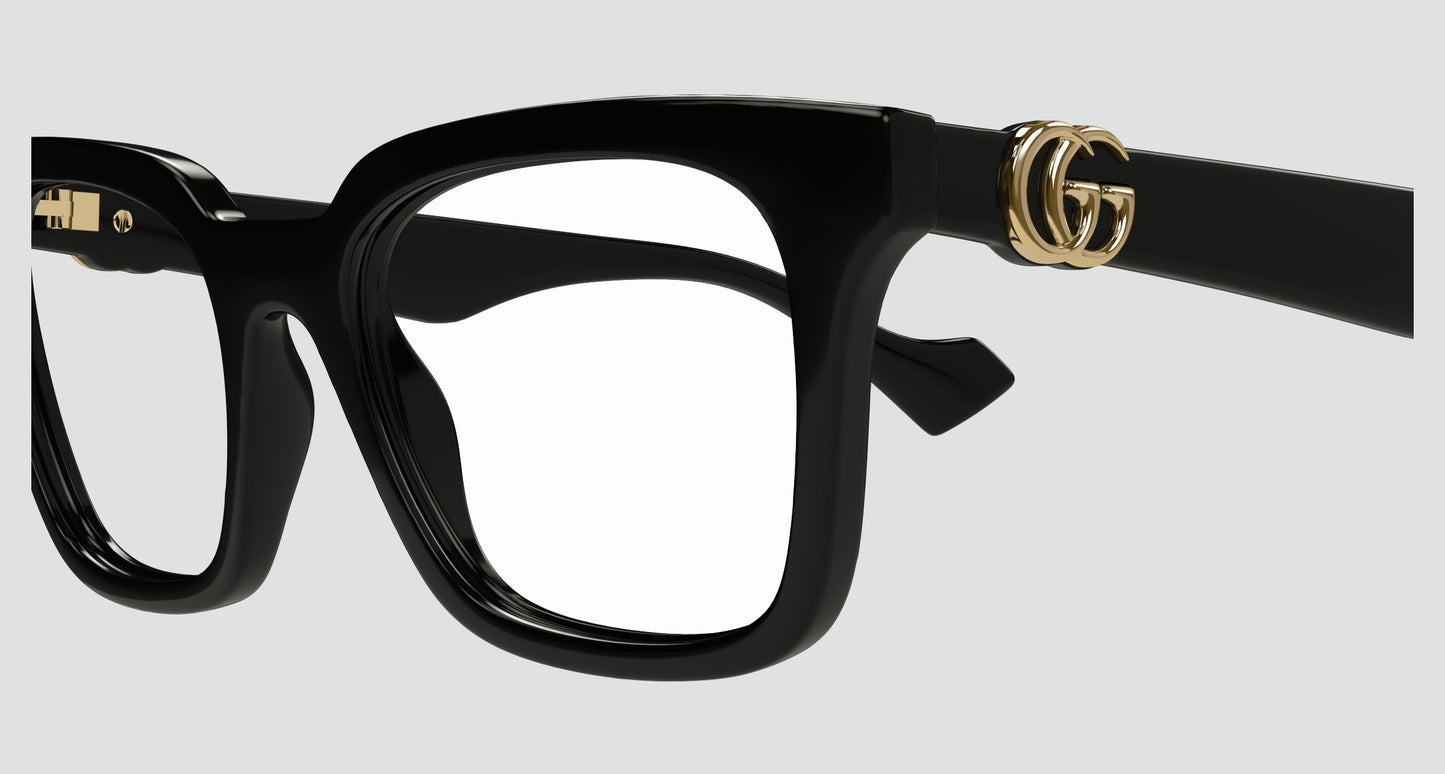Gucci GG1728O-001 Eyeglasses with a gold logo on a light gray background