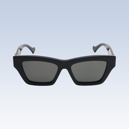 Gucci GG1753S 001 Black Square Sunglasses with dark gray lenses and silver-gray temples, shown from the front on a light blue gradient background.