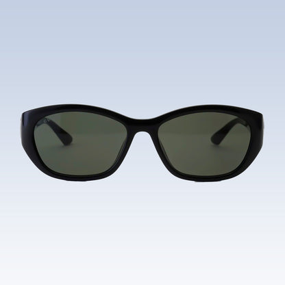 Gucci GG1826SK 001 Black Cat-Eye Sunglasses with dark green lenses, shown from the front against a light blue gradient background.