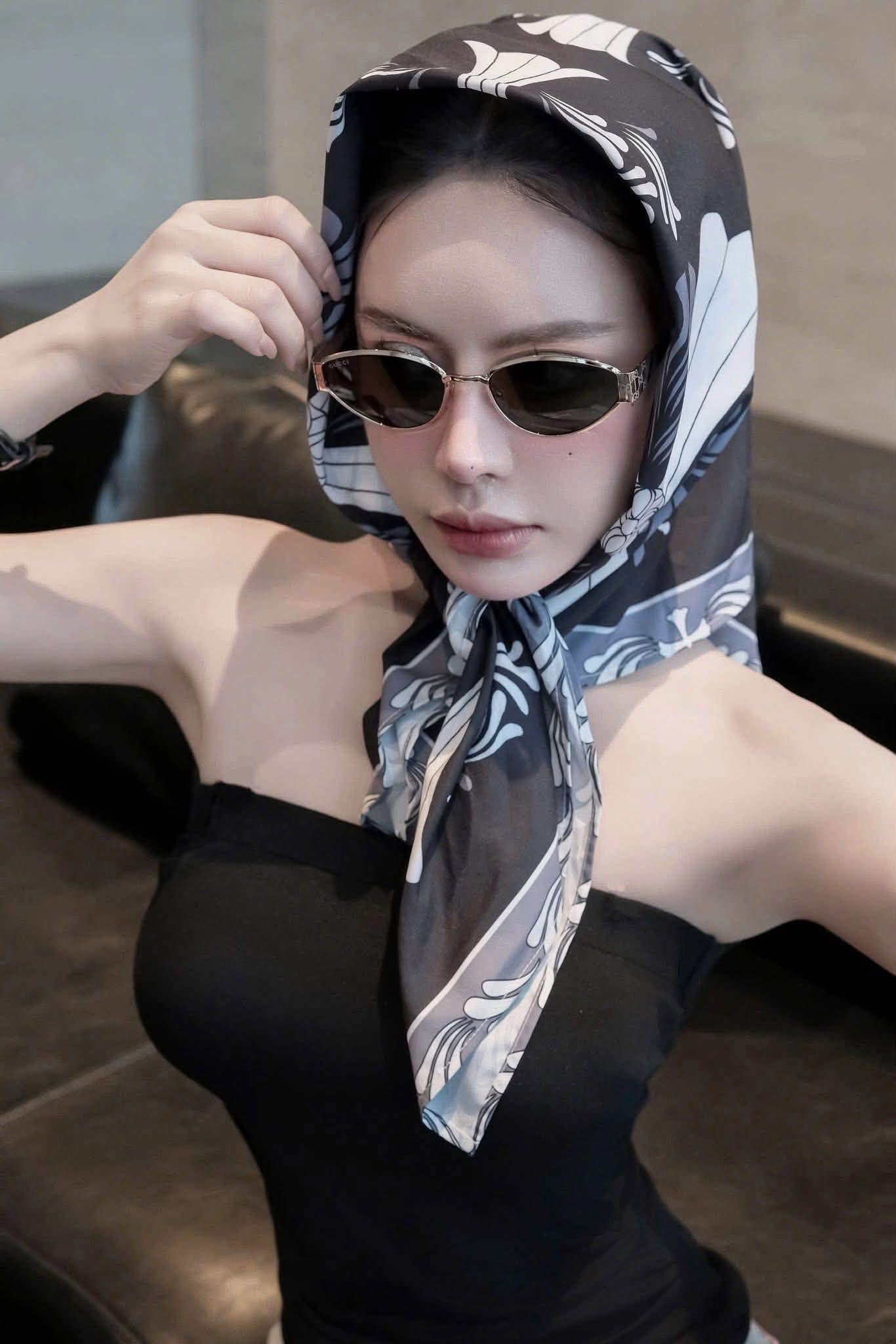 model wearing Gucci GG1853S 001 Gold Butterfly Sunglasses