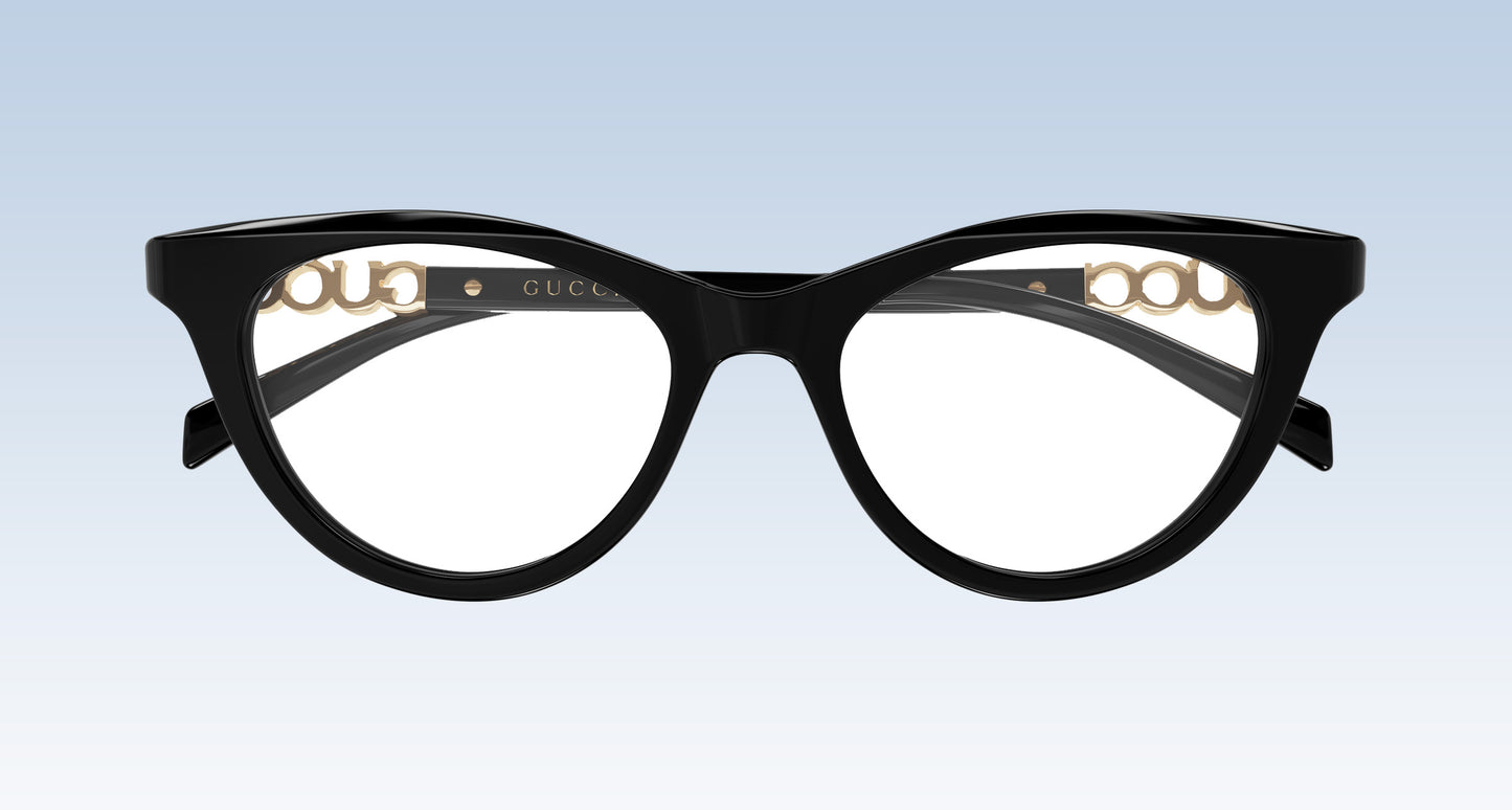 Gucci GG2034O 001 Black Cat-Eye Eyeglasses in glossy black acetate with gold-tone metal details on the inner rims, shown against a light blue gradient background.