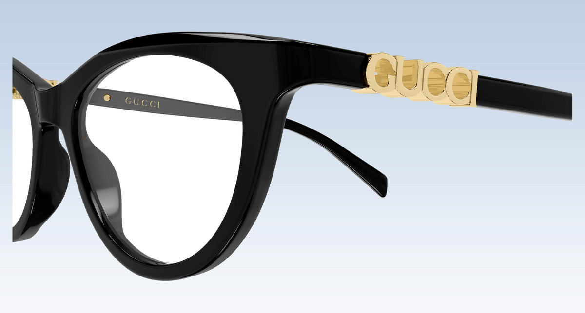 close-up Gucci GG2034O 001 Black Cat-Eye Eyeglasses with "gucci" lettering by gold