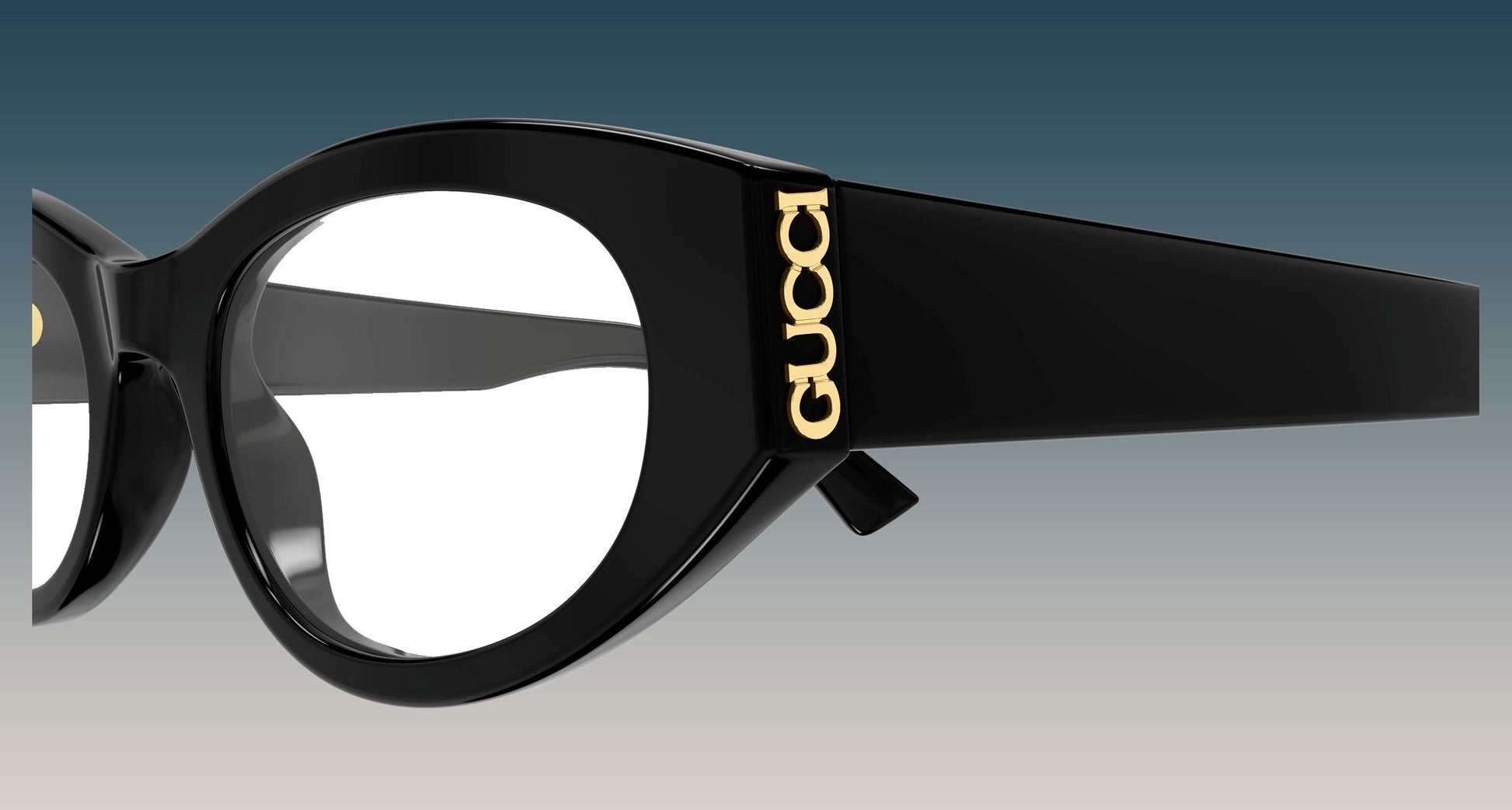 Gucci GG2041O-001 Black Oval Eyeglasses frames with gold-tone 'GUCCI' lettering on the temple, shown against a gradient blue-to-gray background.