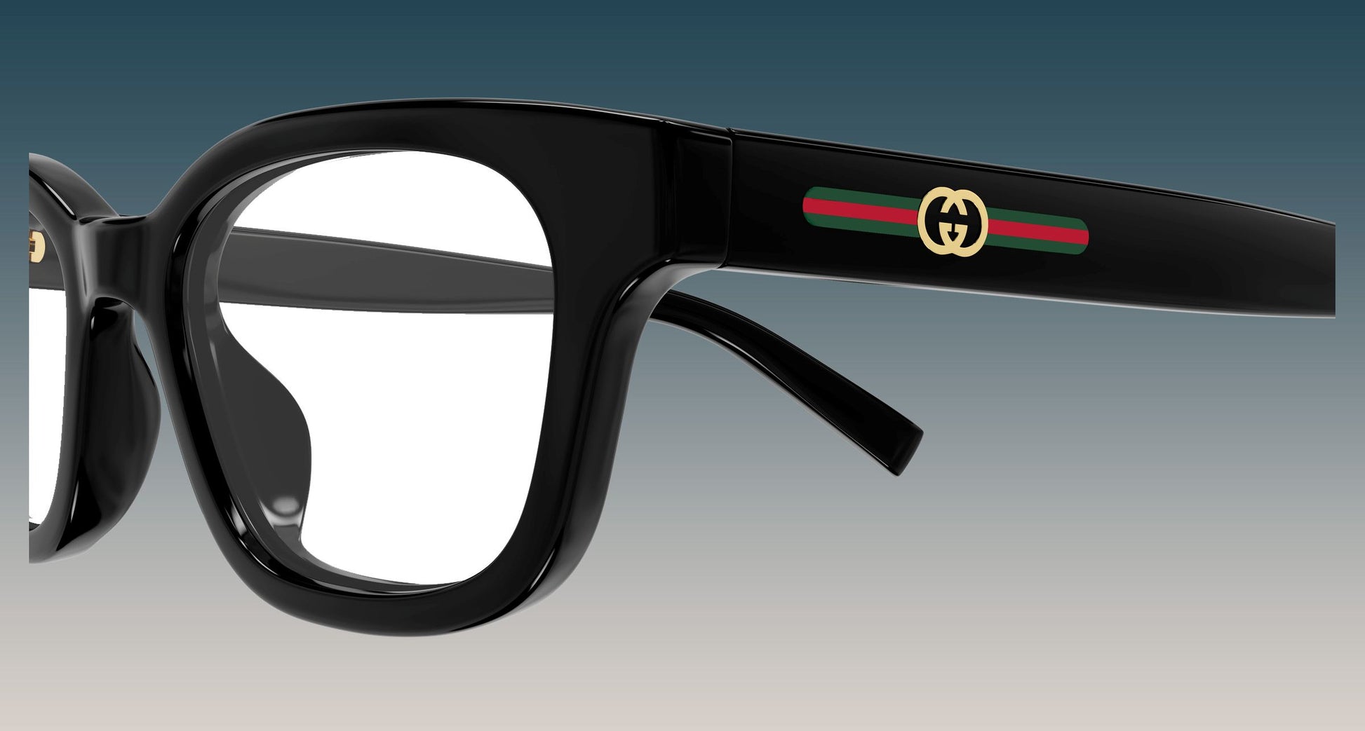 Gucci GG2103OL-001 Black Rectangular Eyeglasses frames with a signature green and red web stripe and gold interlocking GG logo on the temple arm, shown against a gradient gray background.