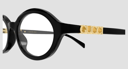 Gucci GG2153O Round Eyeglasses featuring a glossy black acetate frame with gold-tone metal details on the temples, including a prominent interlocking GG logo.