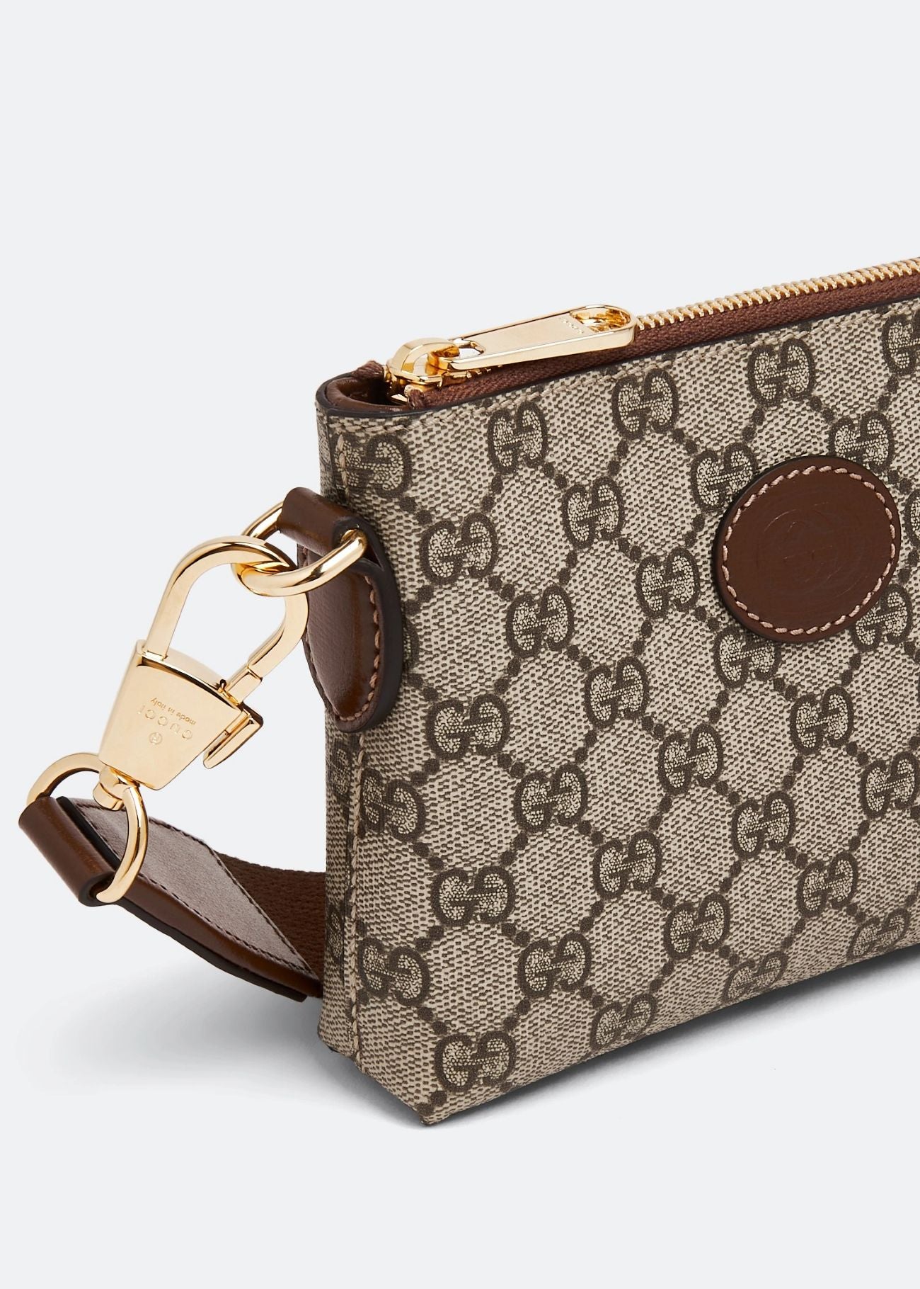 Gucci Interlocking G Mini Messenger Bag Beige 723306 92THG 8563 with patterned fabric and gold hardware on a light gray background