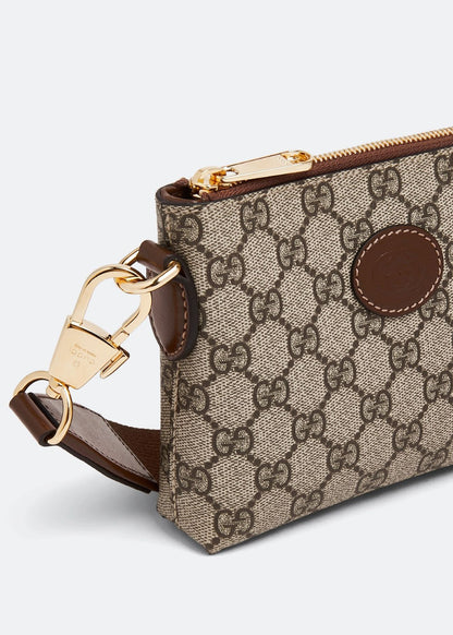 Gucci Interlocking G Mini Messenger Bag Beige 723306 92THG 8563 with patterned fabric and gold hardware on a light gray background