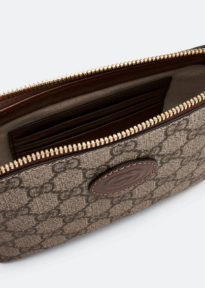 Open Gucci Interlocking G Mini Messenger Bag Beige 723306 92THG 8563 with gold zipper on a light gray background