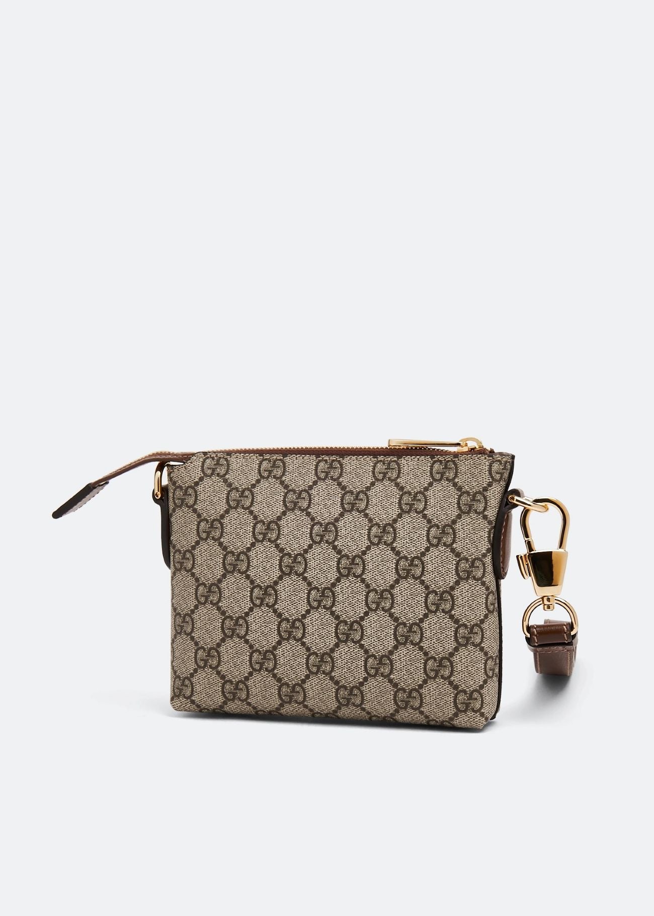 Behind Gucci Interlocking G Mini Messenger Bag Beige 723306 92THG 8563 with a distinctive pattern on a white background
