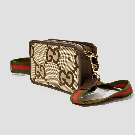 Gucci Jumbo Camel Mini Crossbody Bag 696075 UKMDG 2570 with a distinctive logo pattern and green and red strap on a light gray background