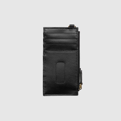 Black leather card case on a light gray background