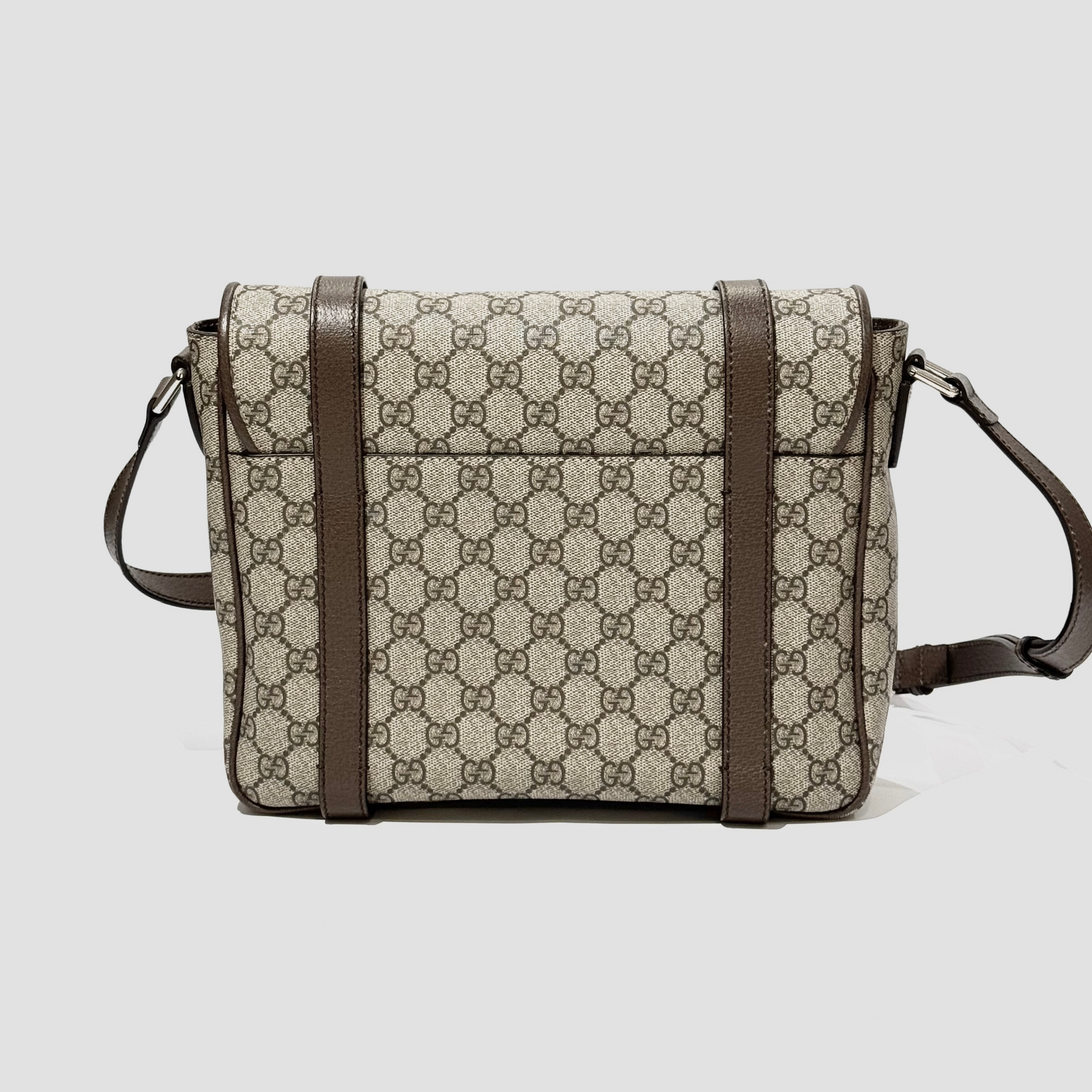Gucci Medium Messenger Interlocking GG Bag Supreme Beige Ebony 658542 K9GSN 8538 with patterned fabric and brown leather straps on a light gray background